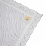 Baby deken gebreid wit