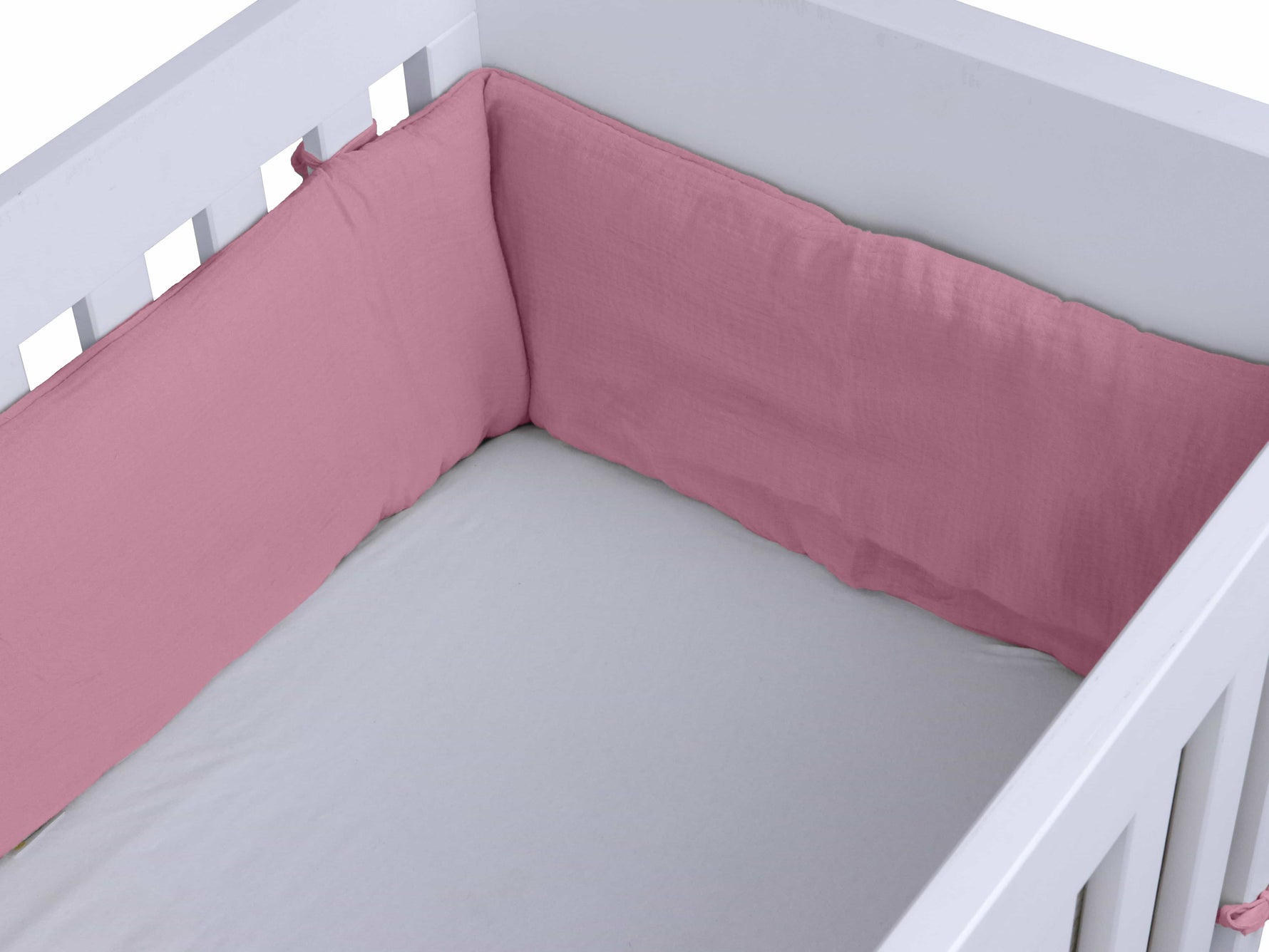 Bedbumper roze ledikant